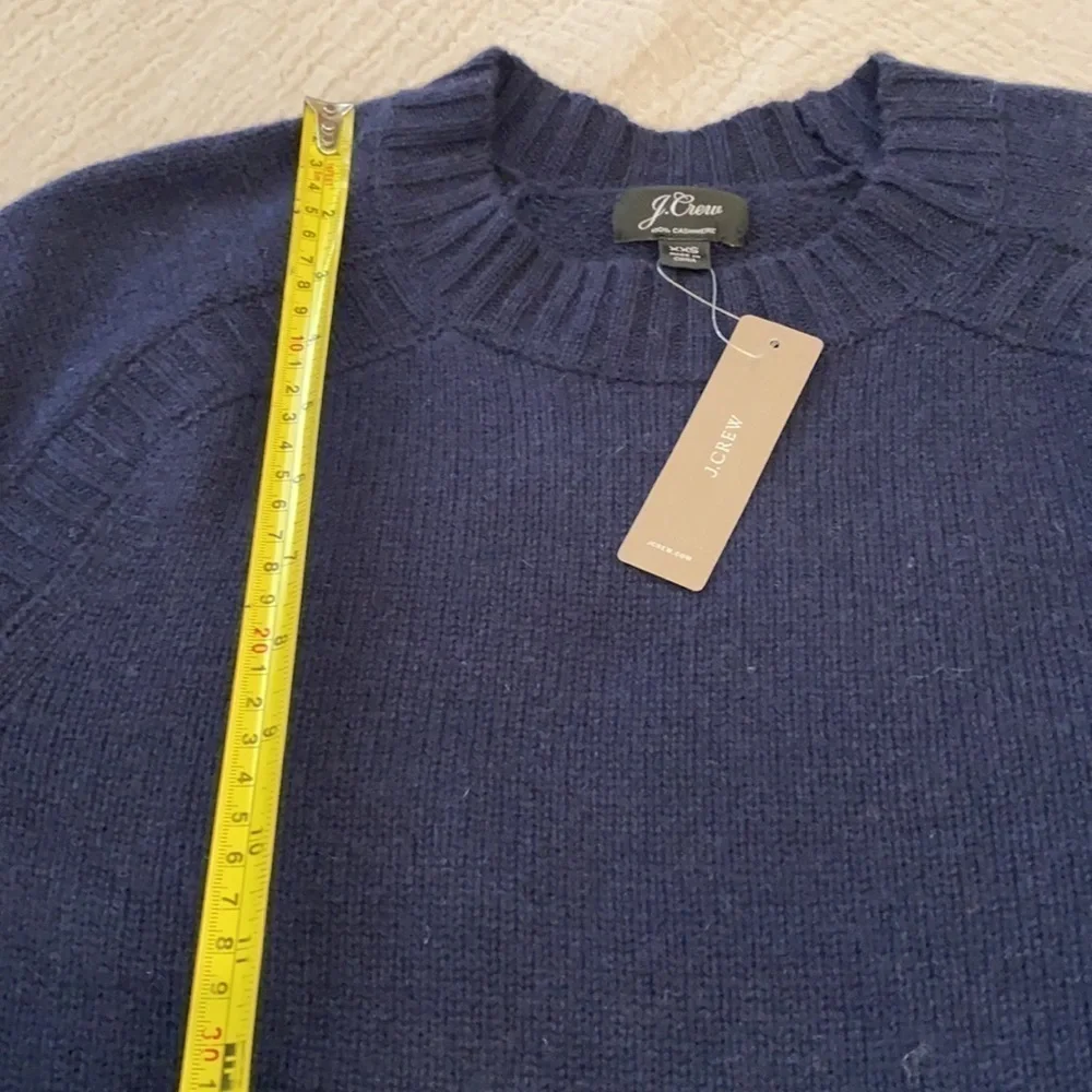 J. Crew 100% cashmere everyday navy sweater. New. Size XXS.